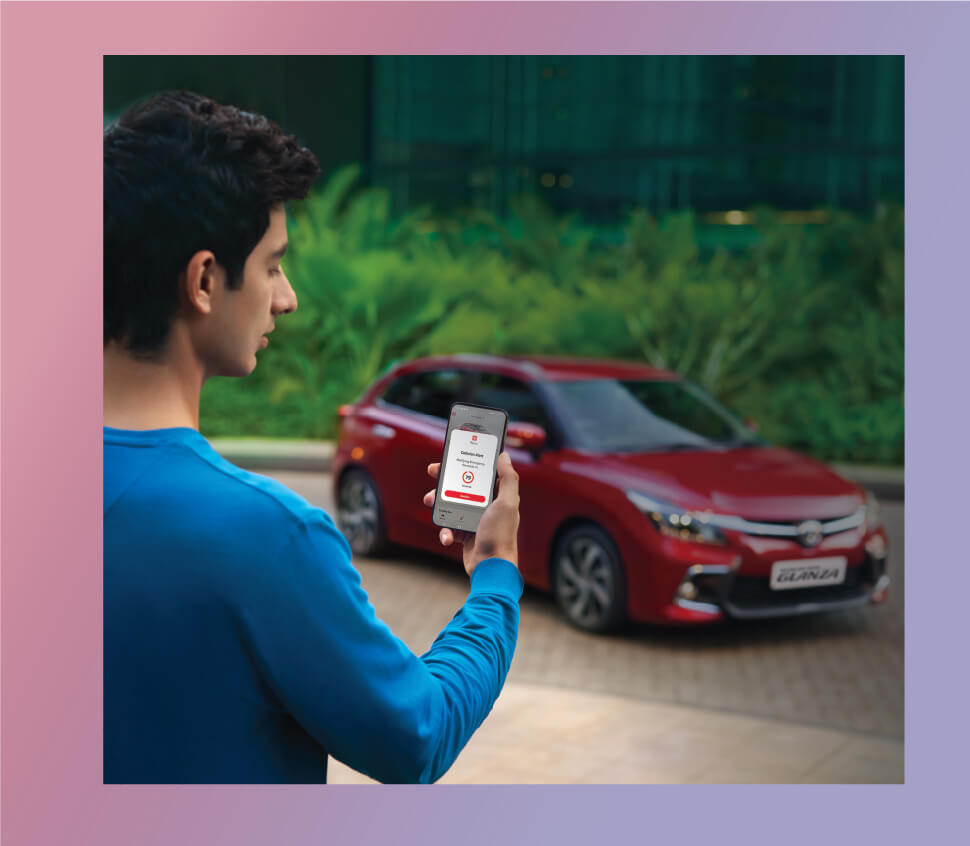 Chris standing up holding his daughter Elva